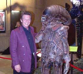 John Hurt poses with an Alien