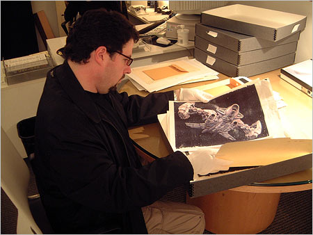 DVD producer Charles de Lauzirika searches through boxes of original production artwork from the Alien films in the Fox Archives.