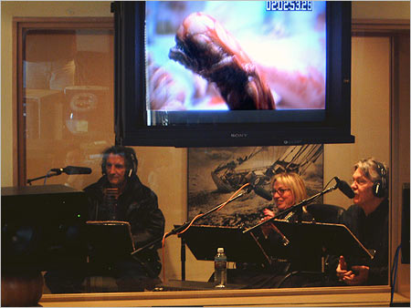 Cast members Harry Dean Stanton (left), Veronica Cartwright, and Tom Skerritt react to a memorable scene from Alien while recording audio commentary for the DVD.