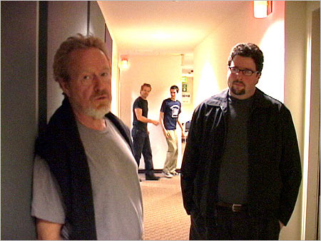 A true Quadrilogy moment. Alien director Ridley Scott (left) confers with Lauzirika about the DVD production, just as Aliens star Michael Biehn happens by down the hall (he's the one looking at the camera).