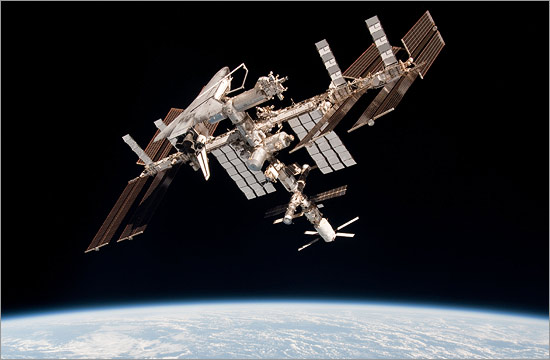 Completed ISS with Space Shuttle