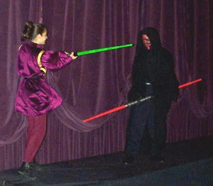 Darth and the unknown Jedi put on a show for the crowd...