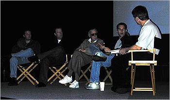 Marvel Studios VP Kevin Feige, X-Men creator Stan Lee and director Bryan Singer (middle L to R) chat with Fox's Peter Staddon (far right) and Sven Davison (far left).